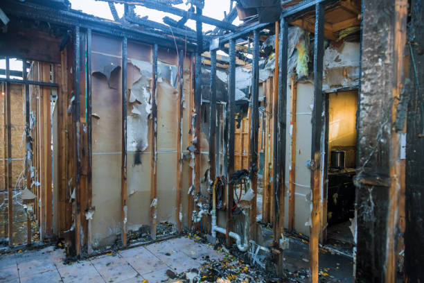 Professional Fire Damage Restoration technician working in Plainwell, MI